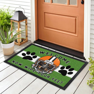 Personalized football doormat with your pup's face on a football helmet graphic